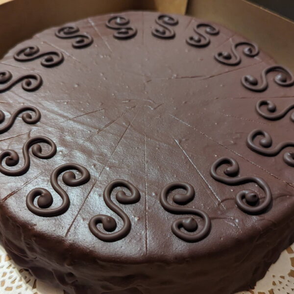 Decadent Sacher Torte—chocolate-glazed perfection with an apricot surprise in every elegant slice