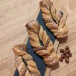 This picture shows 3x light hazelnut bow on a wooden plate