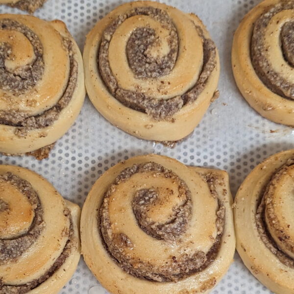 This image shows multiple hazelnut swirls on a baking tray
