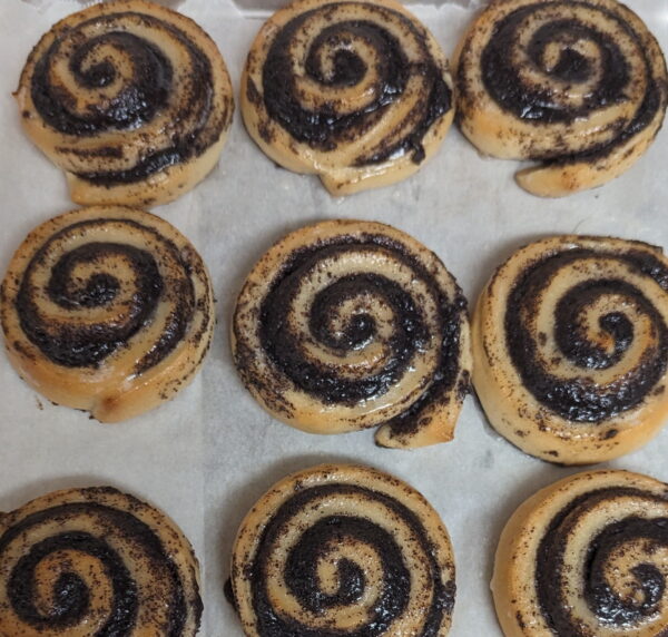 This Picture Shows Multiple Poppy Seed Swirls On A Baking Tray