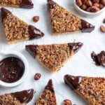 Buttery Nussecken packed with caramelized nuts and dipped in chocolate—Germany’s tastiest triangle