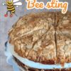 Delicious Bee Sting (Bienenstich) cake with soft dough, honey-caramelized almonds, and a rich vanilla pastry cream filling, topped with a golden, sweet almond glaze