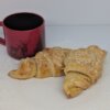 our newest item, almond croissants with toasted almonds and powdered sugar from Bretzel in Victoria BC