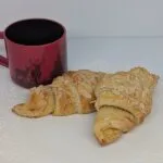 our newest item, almond croissants with toasted almonds and powdered sugar from Bretzel in Victoria BC