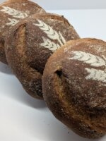 Crusty Black Forest Farmhouse bread made with white and rye flour — rustic outside like a mountain path, soft inside like morning mist.