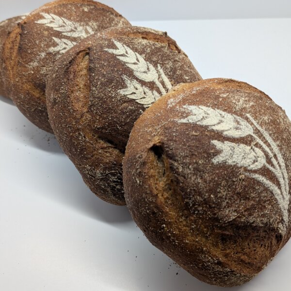 Crusty Black Forest Farmhouse bread made with white and rye flour — rustic outside like a mountain path, soft inside like morning mist.