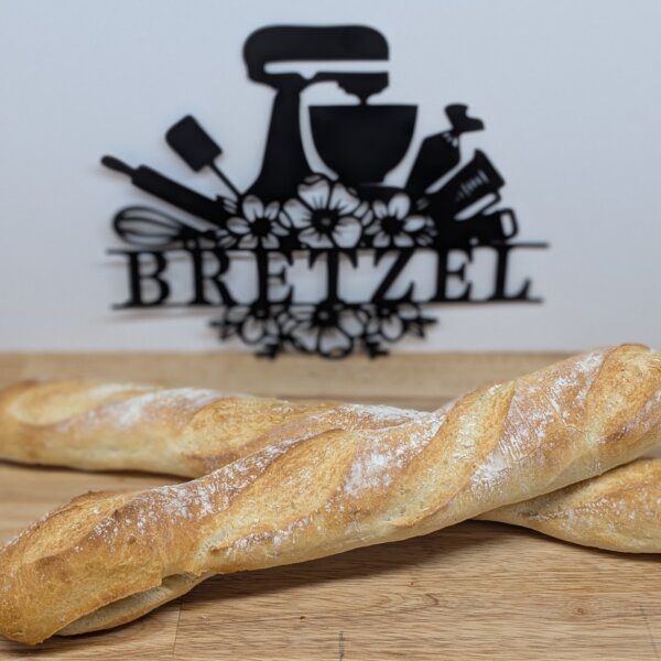 A golden crusted Original Alsace Baguette, ready to steal the spotlight and your appetite